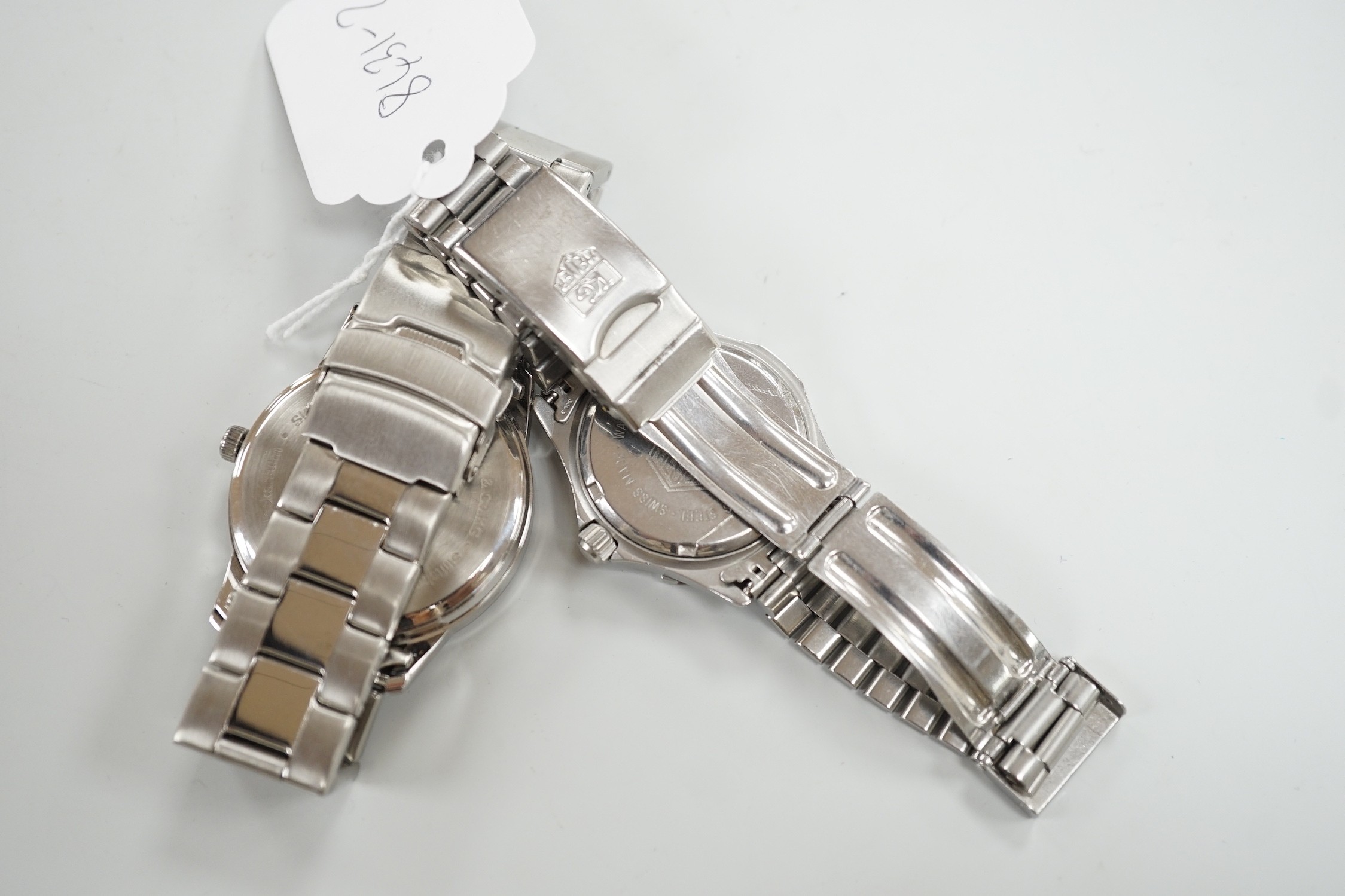 A gentleman's stainless steel Tag Heuer quartz wrist watch, together with a gentleman's stainless steel backed Owim GMBH & Co quartz wrist watch.